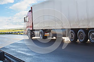 truck going on the highway to rain