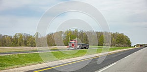 Truck on a highway in US, spring day