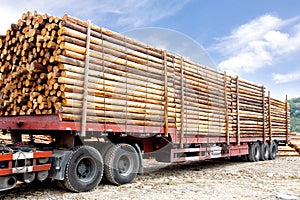 Truck loaded with wooden beams