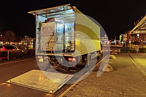 A truck with lowered tail lift