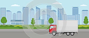 Truck on modern city background . Transport services and freight of goods concepts.