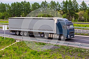 truck moves on country highway