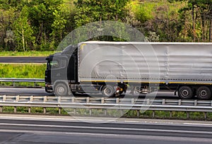 truck moves on country highway