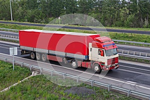 truck moves on country highway