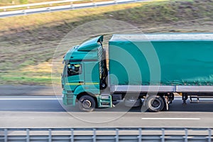 truck moves on country highway