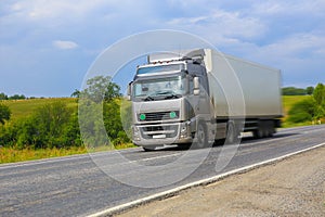 truck moves on country highway