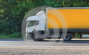 Truck moves on highway