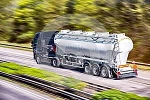 Truck moves on the road at speed