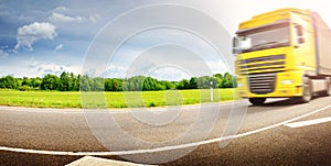 Truck moving on the highway in summer