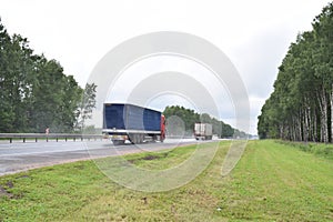 The truck is moving very fast along the motorway