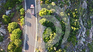 Truck passing on a road by the sea. Transportation travel concept. Exotic destination,Aerial bird view