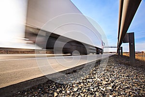 Truck passing through a toll gate on a highway