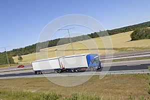 Truck in profile on highway