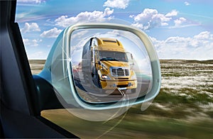 Truck in the rear-view mirror