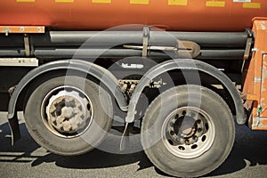 Truck on road. Car is driving on highway. Freight transport on highway