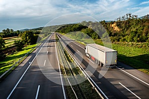 Truck with semi-trailer on highway