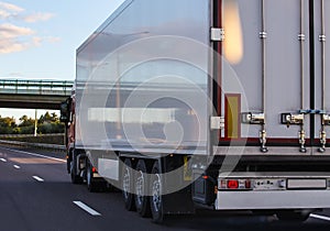 Truck with semitrailer moves along the road.