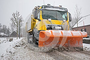 Truck with snowplow, winter service