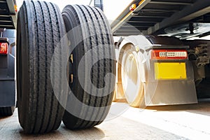 Truck spare wheels tire waiting for to change, truck repairing and maintenance