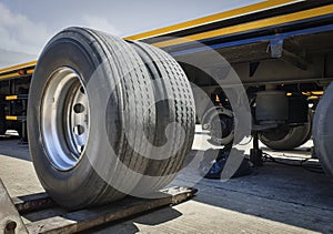 Truck Spare Wheels Tyre Waiting for to Change. Semi Truck Maintenace and Repairing
