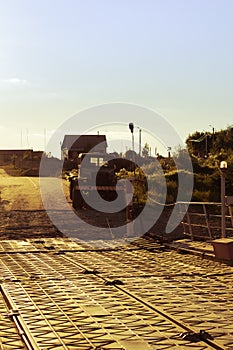 A truck standing on the river bank