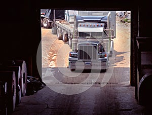 Truck in Steel Warehouse Door