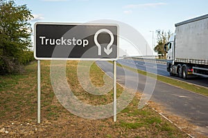 truck stop road sign on uk motorway in england