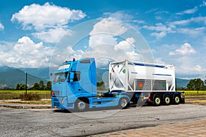 Truck with tank trailer parked