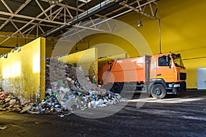 Truck throws garbage at sorting modern waste recycling processing plant. Separate and sorting garbage collection. Recycling and