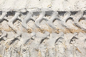 Truck Tire Tracks in Sand of Road Work Construction