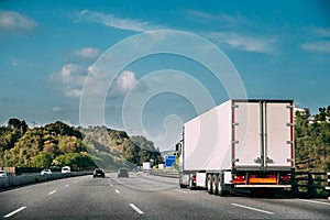 Truck Or Traction Unit In Motion On Road, Freeway. Asphalt Motor