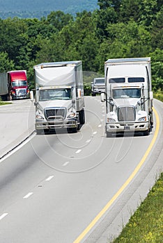 Truck Traffic On Interstate Highway Vertical With Copy Space