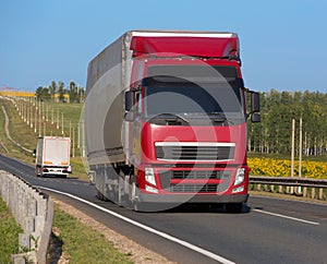 Truck with trailer goes on the highway