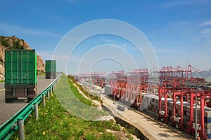 Truck transport container on the road to the port