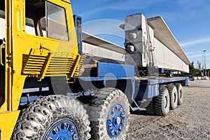 Truck transport pre-fabricated concrete beam to construct light rail transit infrastructure