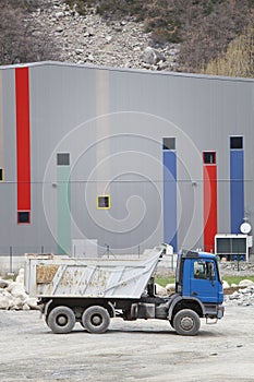 Truck for transportation of building materials. Construction site