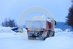 Truck Transporting Snow to Snow Dump in Winter