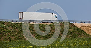 truck transports freight on the country highway