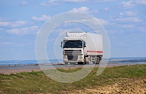 Truck transports freight on the country highway