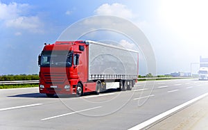 Truck transports goods by road - shipping and logistics photo