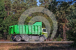 Truck trash truck on the road.