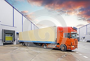 Truck in unloading in warehouse