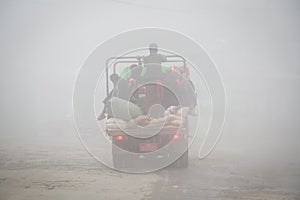 Truck vehicle at road during a heavy rainfall. Dangerous lorry driving at bad weather conditions