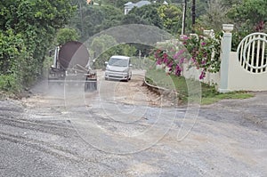 Truck With Water Sprinkles Road