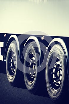 Truck wheels closeup in motion