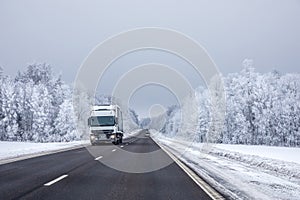 Truck on winter country road