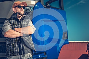 Trucker In Front of Truck