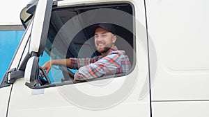 Trucker Preparing For Trip. Caucasian Men Talking on CB Radio. Truck Driver Job