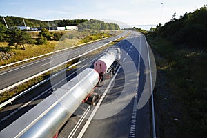 Trucking on scenic freeway, fuel truck