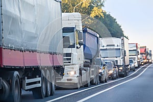 Trucks and cars in a big traffic jam